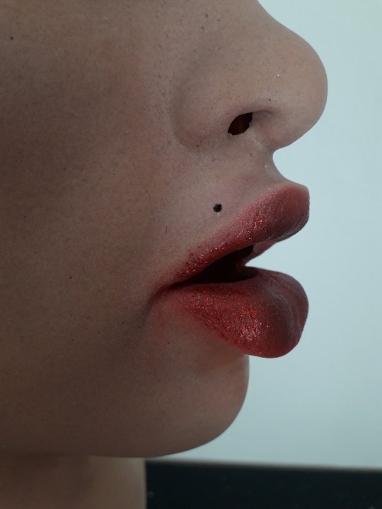 Kvindemaske i latex. Flere typer/modeller kan tages hjem. 